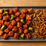 One-day backpacking food menu with couscous and bean-and-rice meals