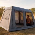 A picturesque view of an inflatable tent set up in a scenic outdoor location