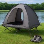 Tent cot set up in a scenic outdoor location